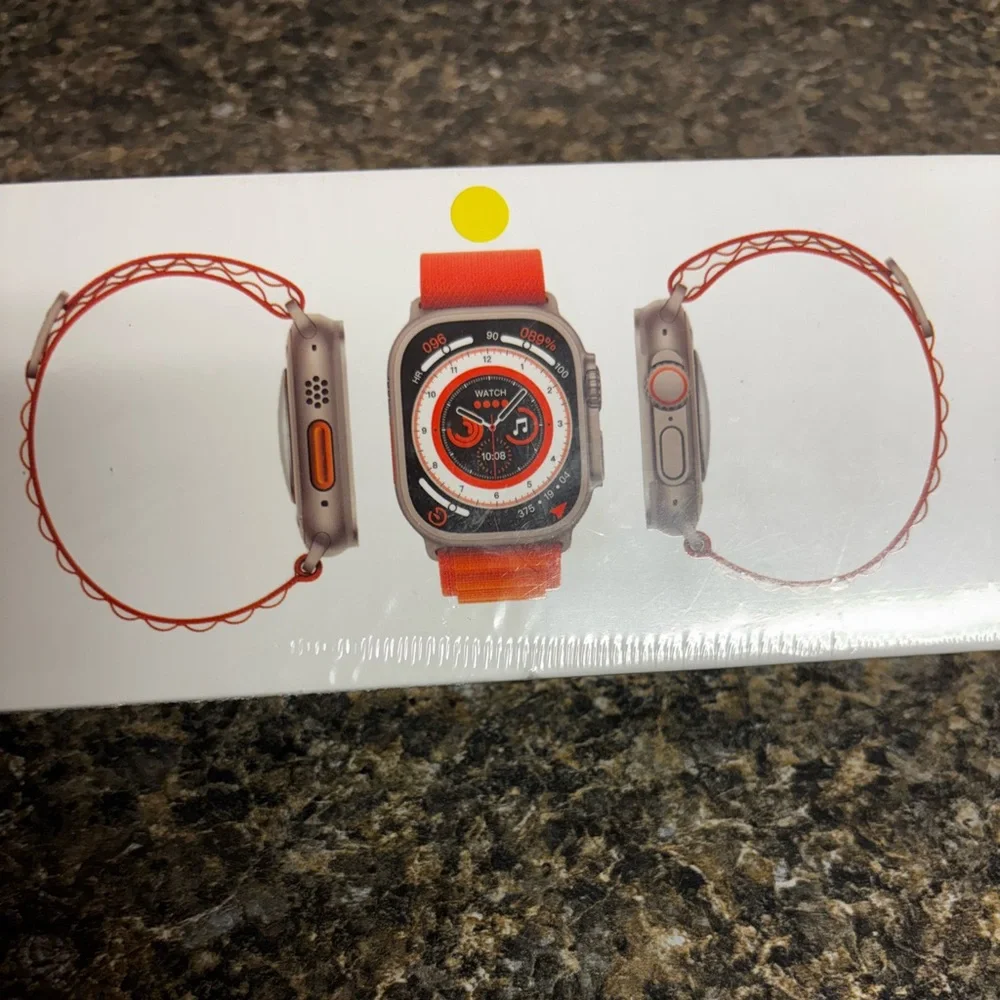 Smartwatch with i believe yellow band.